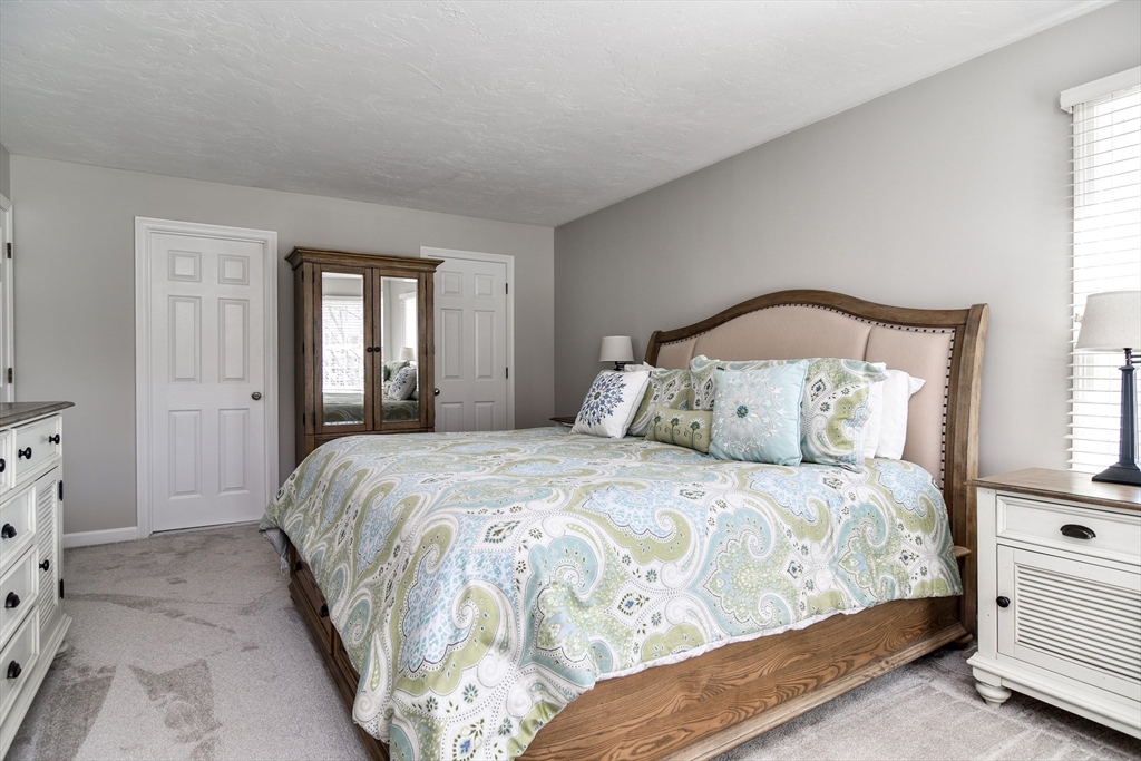 16 Russet Hill Road Ashland, MA 01721 - Photo 19 of 30 a bedroom with a bed and a window