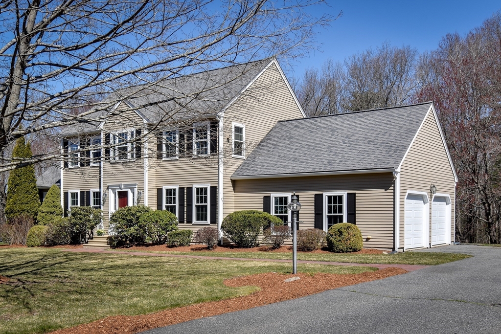 16 Russet Hill Road Ashland, MA 01721 - Photo 2 of 30 a front view of a house with a yard