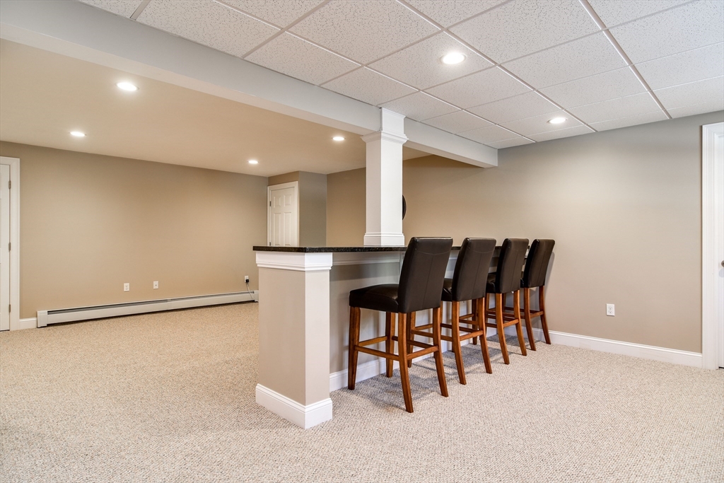 16 Russet Hill Road Ashland, MA 01721 - Photo 24 of 30 a view of a room with furniture and a table