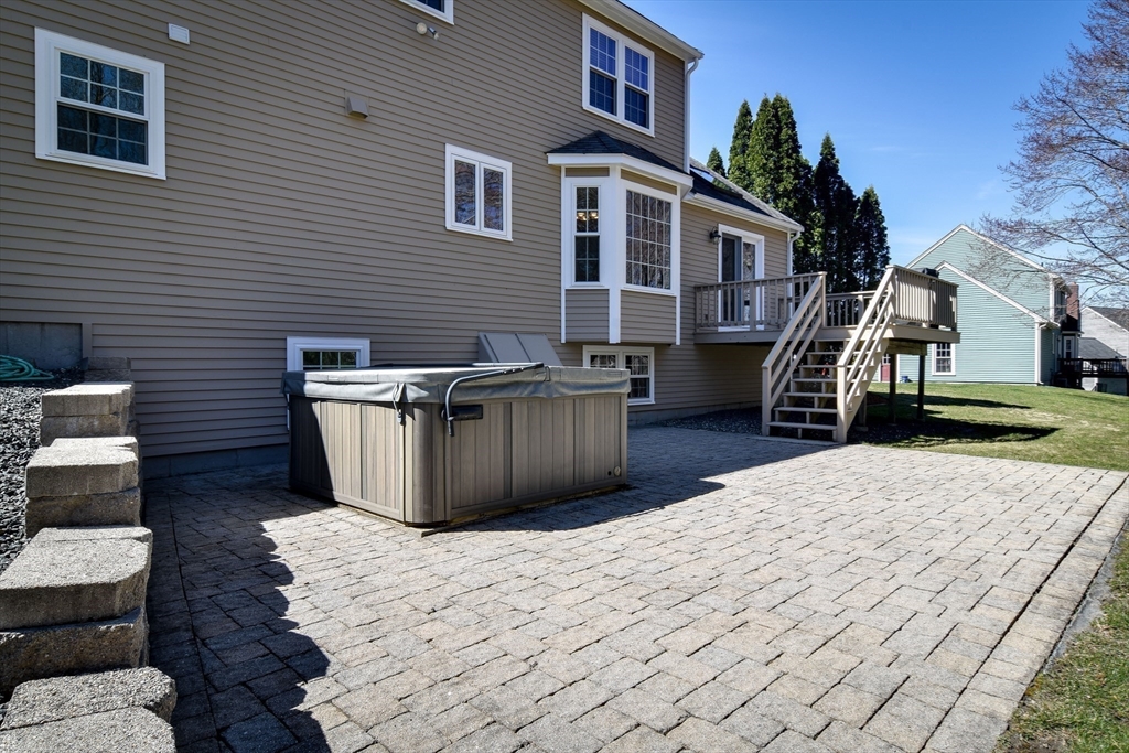 16 Russet Hill Road Ashland, MA 01721 - Photo 27 of 30 a view of a house with wooden deck and furniture