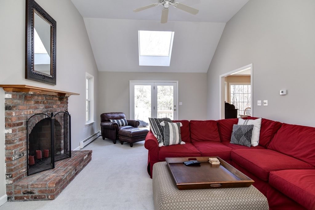 16 Russet Hill Road Ashland, MA 01721 - Photo 7 of 30 a living room with furniture and a fireplace