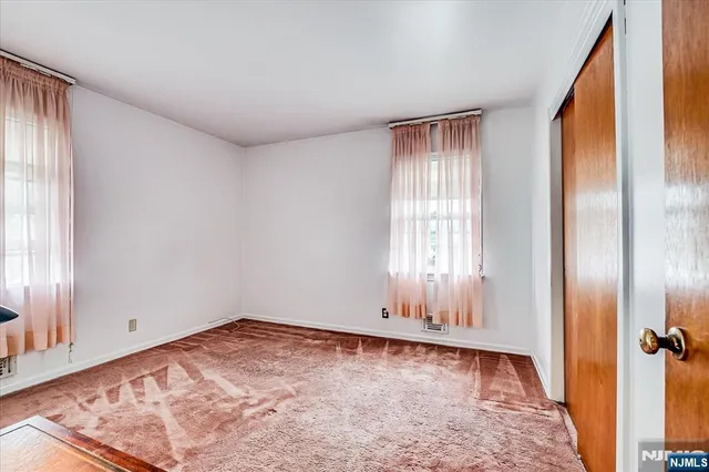 wooden floor and window in a room
