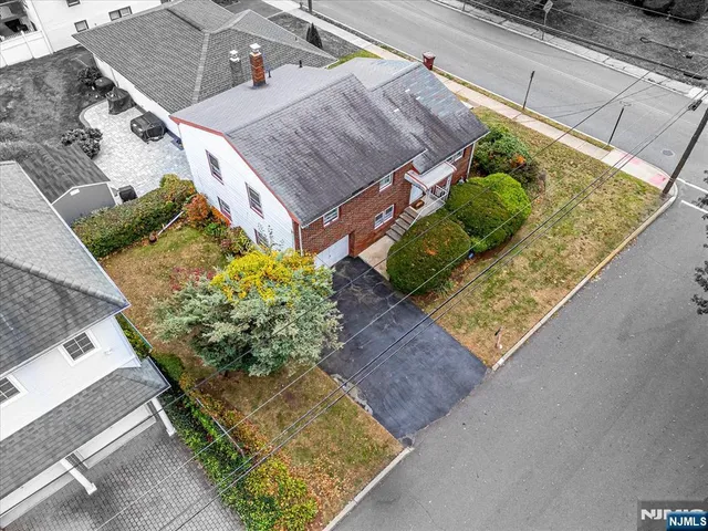 a view of a wooden terrace with a bench