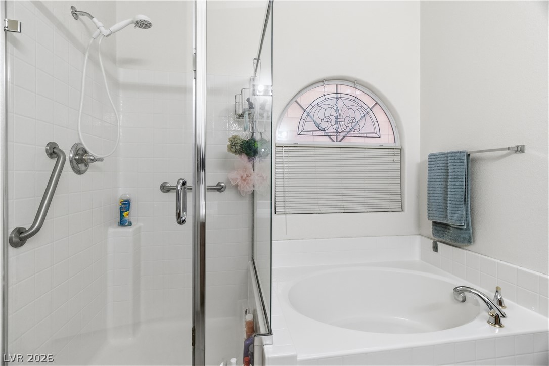 2516 Morrow Ridge Place Laughlin, NV 89029 - Photo 29 of 93 Full Primary bath featuring a shower stall and a bath