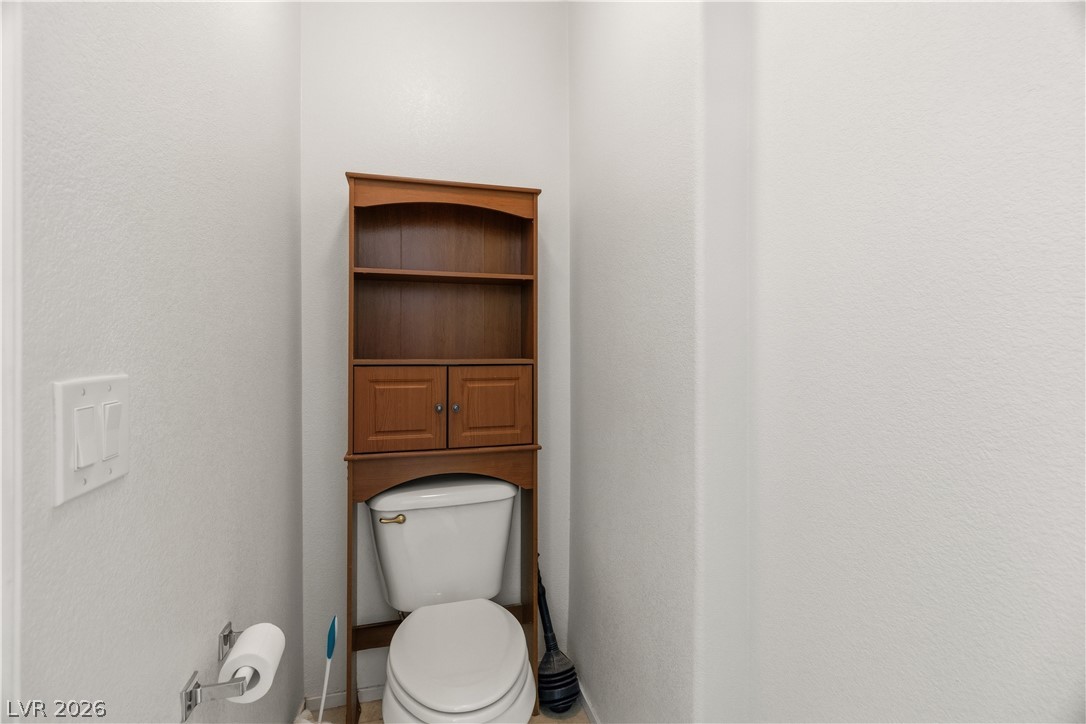 2516 Morrow Ridge Place Laughlin, NV 89029 - Photo 30 of 93 Primary ensuite Bathroom featuring a water closet with toilet
