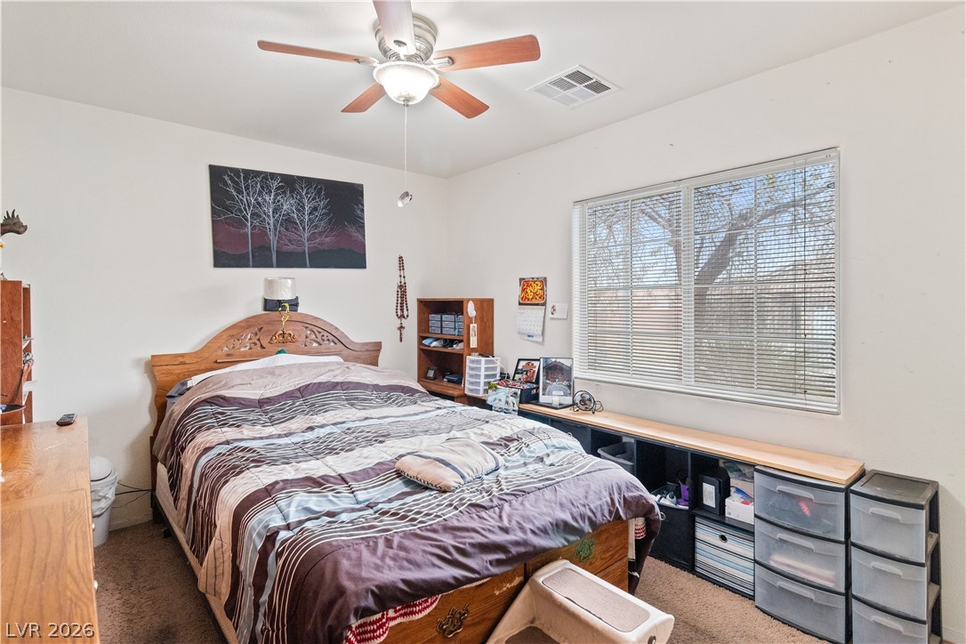 2516 Morrow Ridge Place Laughlin, NV 89029 - Photo 35 of 93 Third Bedroom featuring carpet and ceiling fan