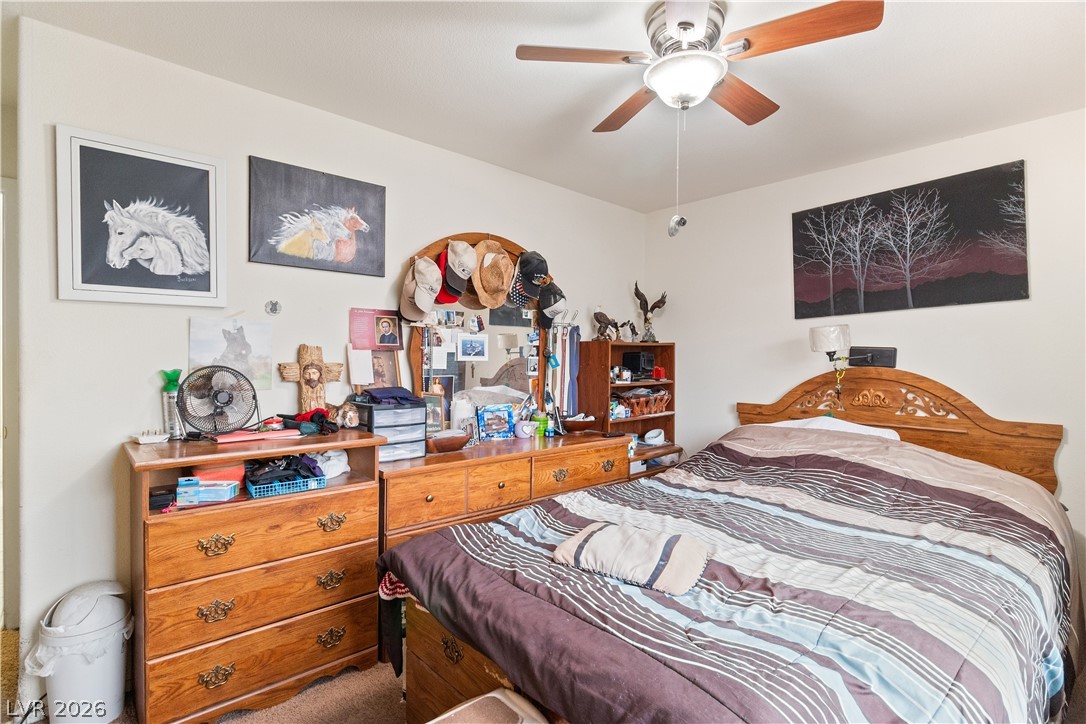 2516 Morrow Ridge Place Laughlin, NV 89029 - Photo 36 of 93 Carpeted Third bedroom featuring a ceiling fan
