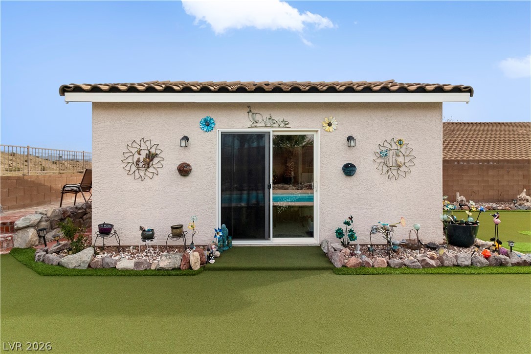 2516 Morrow Ridge Place Laughlin, NV 89029 - Photo 39 of 93 Casita / Guest Quarters located in the backyard featuring a tiled roof, stucco siding, and a patio area