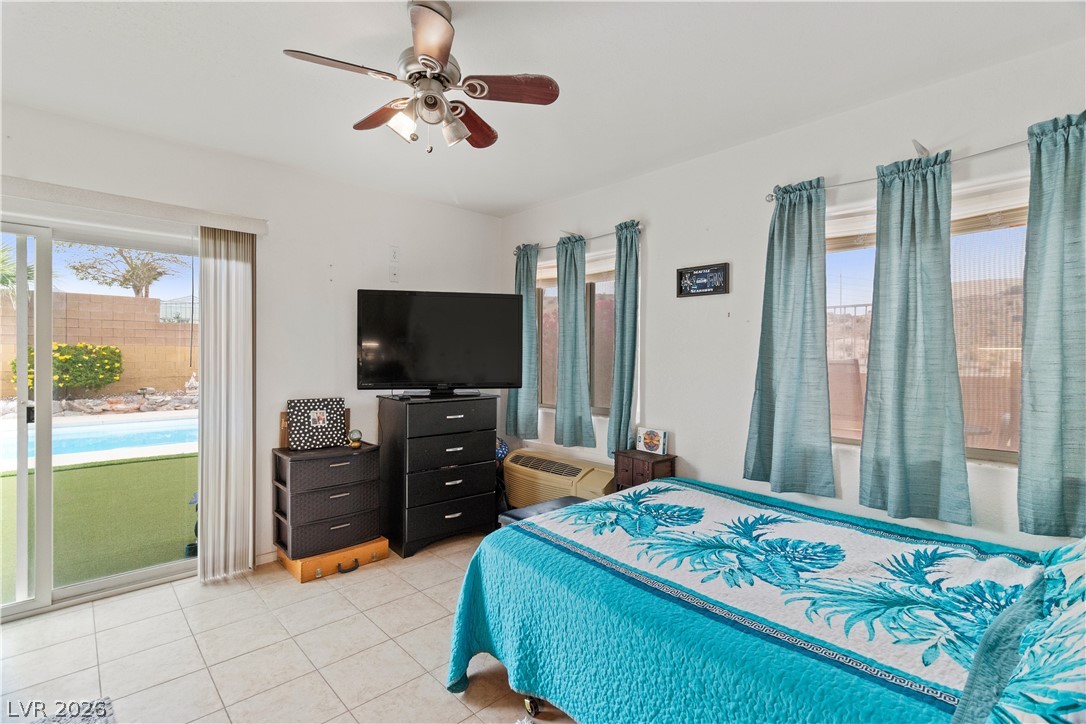 2516 Morrow Ridge Place Laughlin, NV 89029 - Photo 40 of 93 Casita / Guest Quarters featuring access to exterior, ceiling fan, and light tile patterned flooring