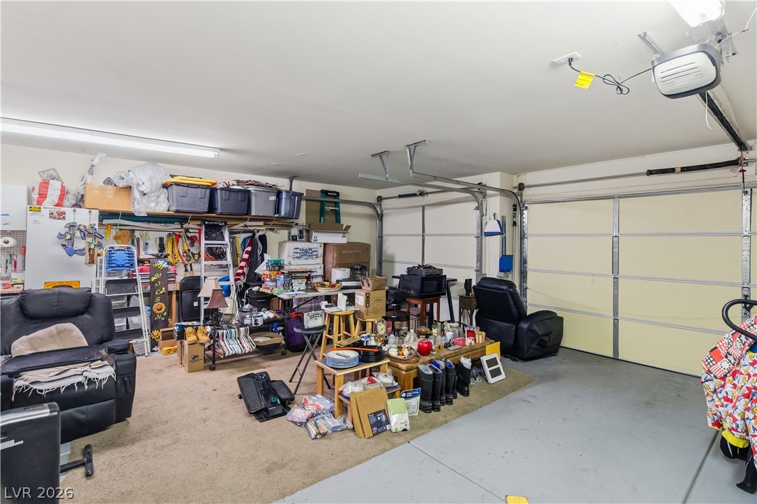 2516 Morrow Ridge Place Laughlin, NV 89029 - Photo 48 of 93 Garage with a garage door opener and freestanding refrigerator