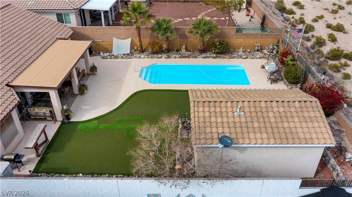 2516 Morrow Ridge Place Laughlin, NV 89029 - Photo 74 of 93 View of swimming pool featuring patio surround and a fenced backyard