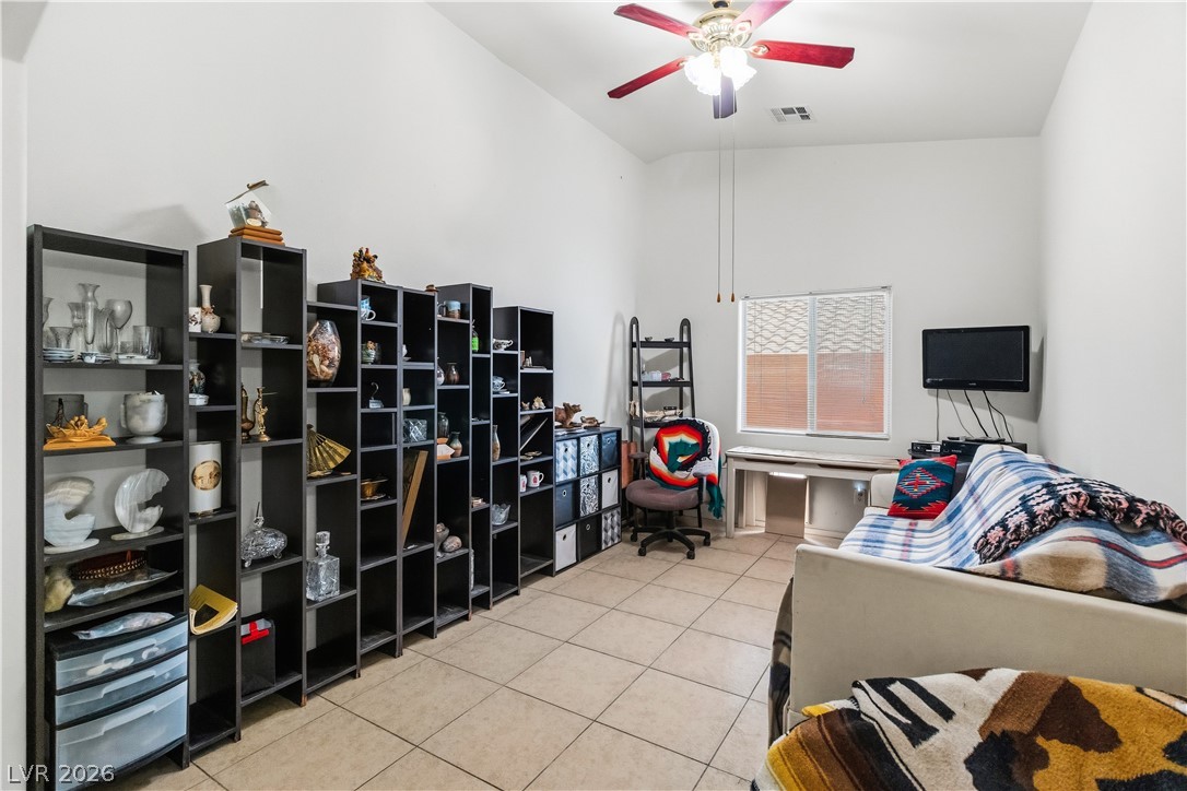 2516 Morrow Ridge Place Laughlin, NV 89029 - Photo 8 of 93 Dining room featuring a desk, light tile patterned floors, and a ceiling fan