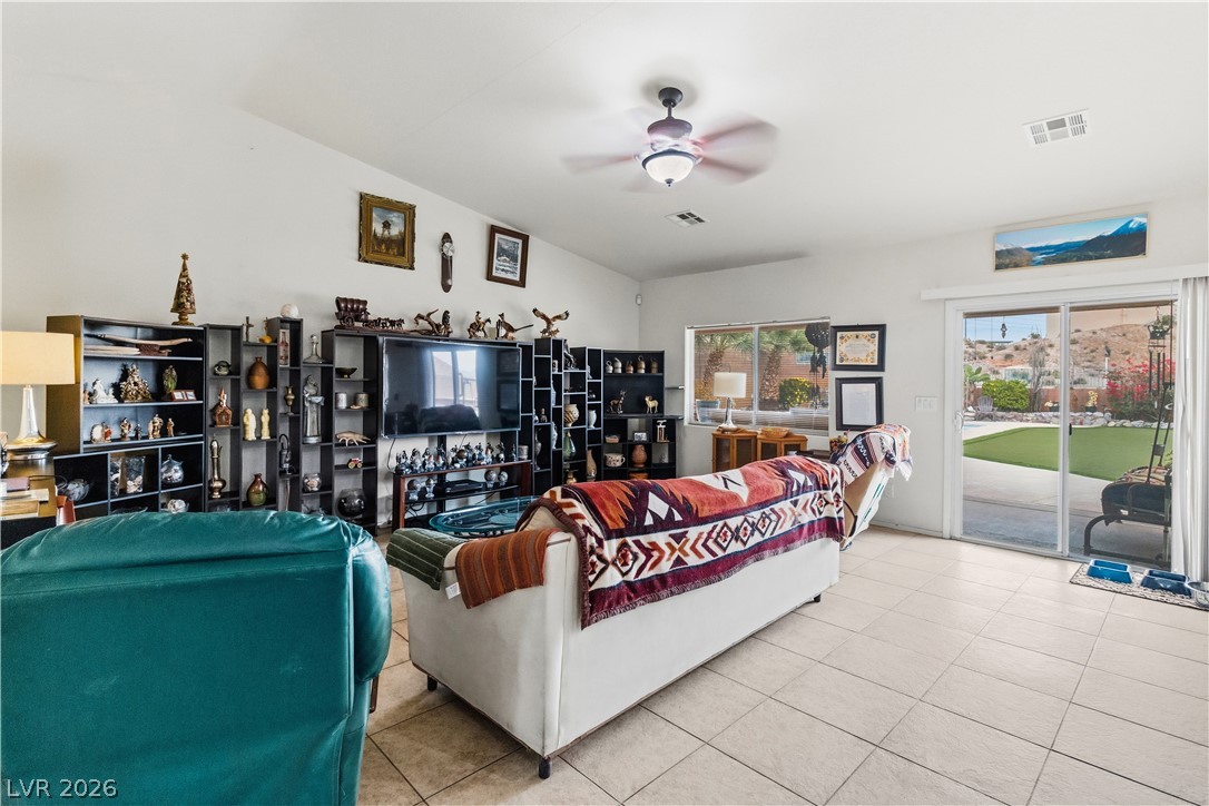 2516 Morrow Ridge Place Laughlin, NV 89029 - Photo 10 of 93 Living area featuring a ceiling fan and tile patterned floors