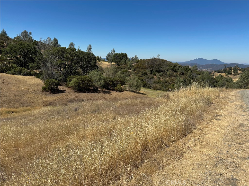 22017 No Guns Road Clearlake Oaks, CA 95423 - Photo 6 of 8 a view of lake and mountain
