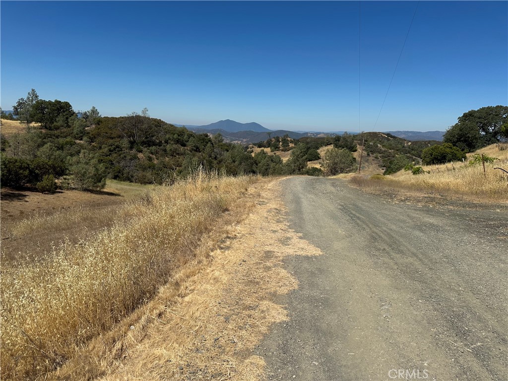 22017 No Guns Road Clearlake Oaks, CA 95423 - Photo 7 of 8 a view of lake
