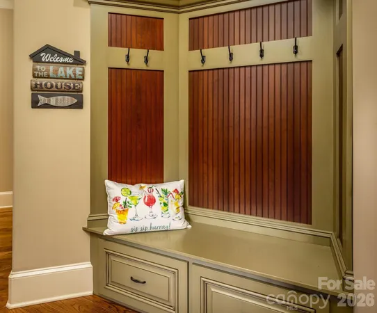 a view of front door with wooden floor