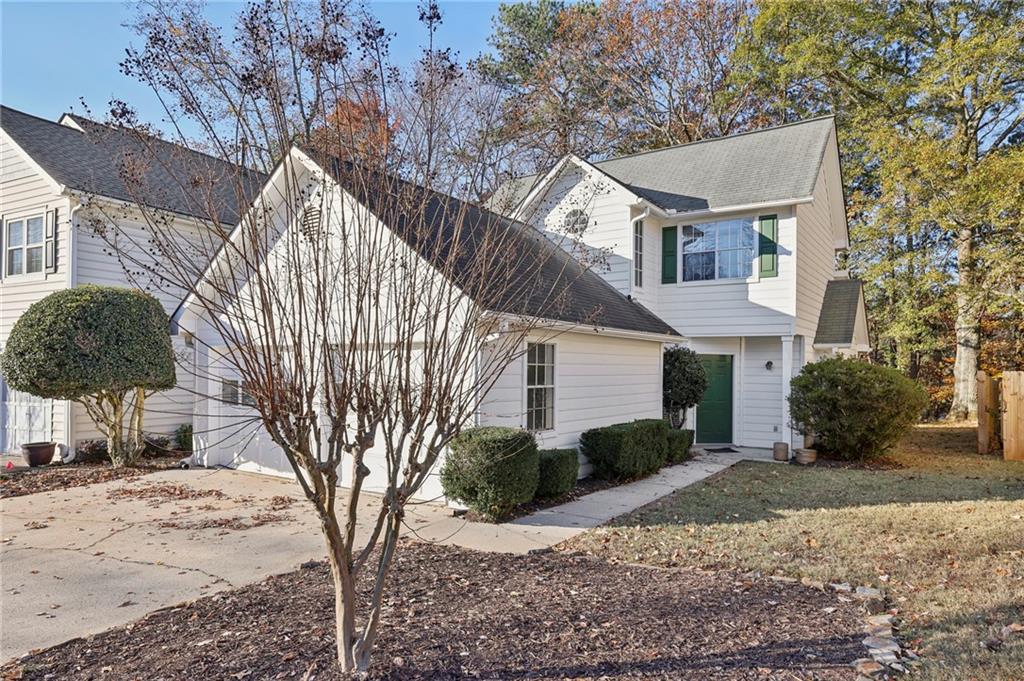 820 Bridge Pointe Court Alpharetta, GA 30005 - Photo 1 of 1 a view of a house with a yard