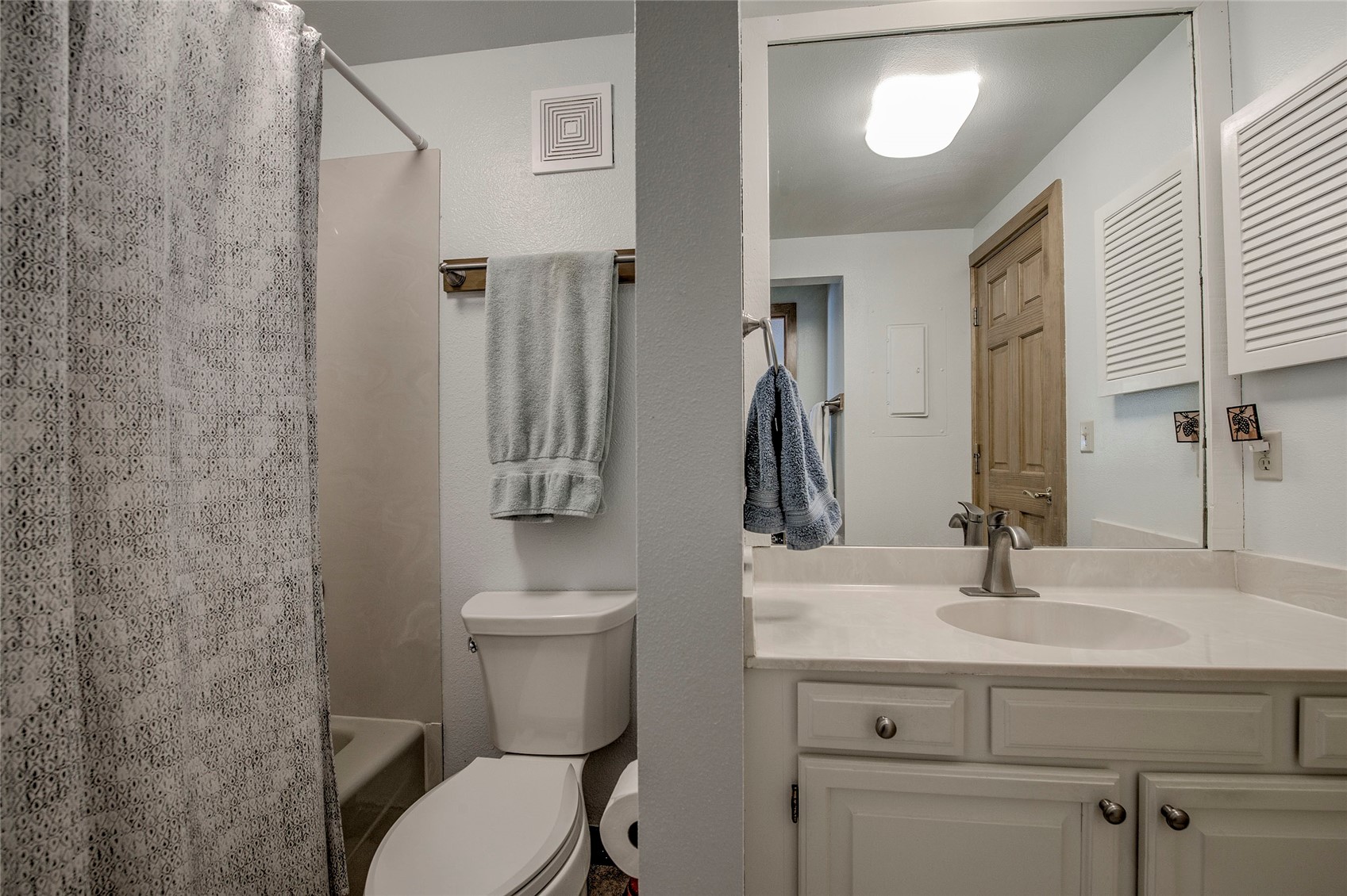 187 Fuller Placer Road, Unit B Breckenridge, CO 80424 - Photo 15 of 33 a bathroom with a sink toilet and mirror