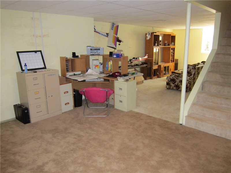 851 Seven Hills Road Chicora, PA 16025 - Photo 15 of 16 Basement/Game Room. Plenty of living space in the basement, including the family room