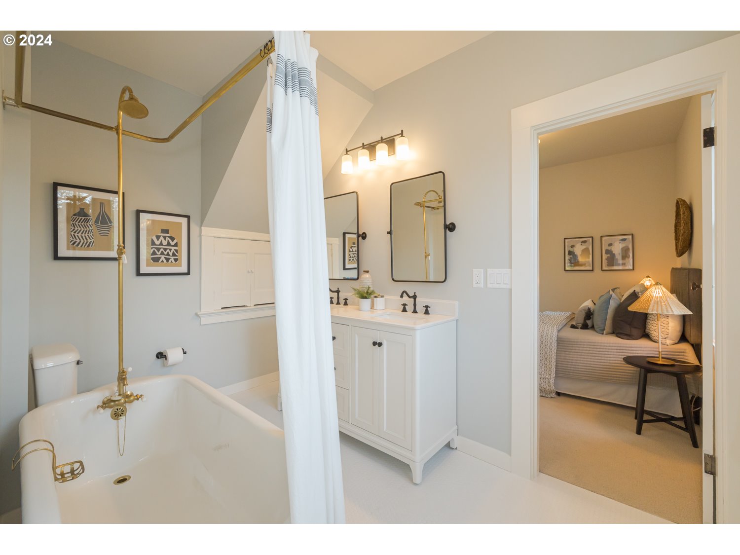 2707 Southwest Homar Avenue Portland, OR 97201 - Photo 12 of 48 a en suite bathroom with a double vanity sink tub and mirror