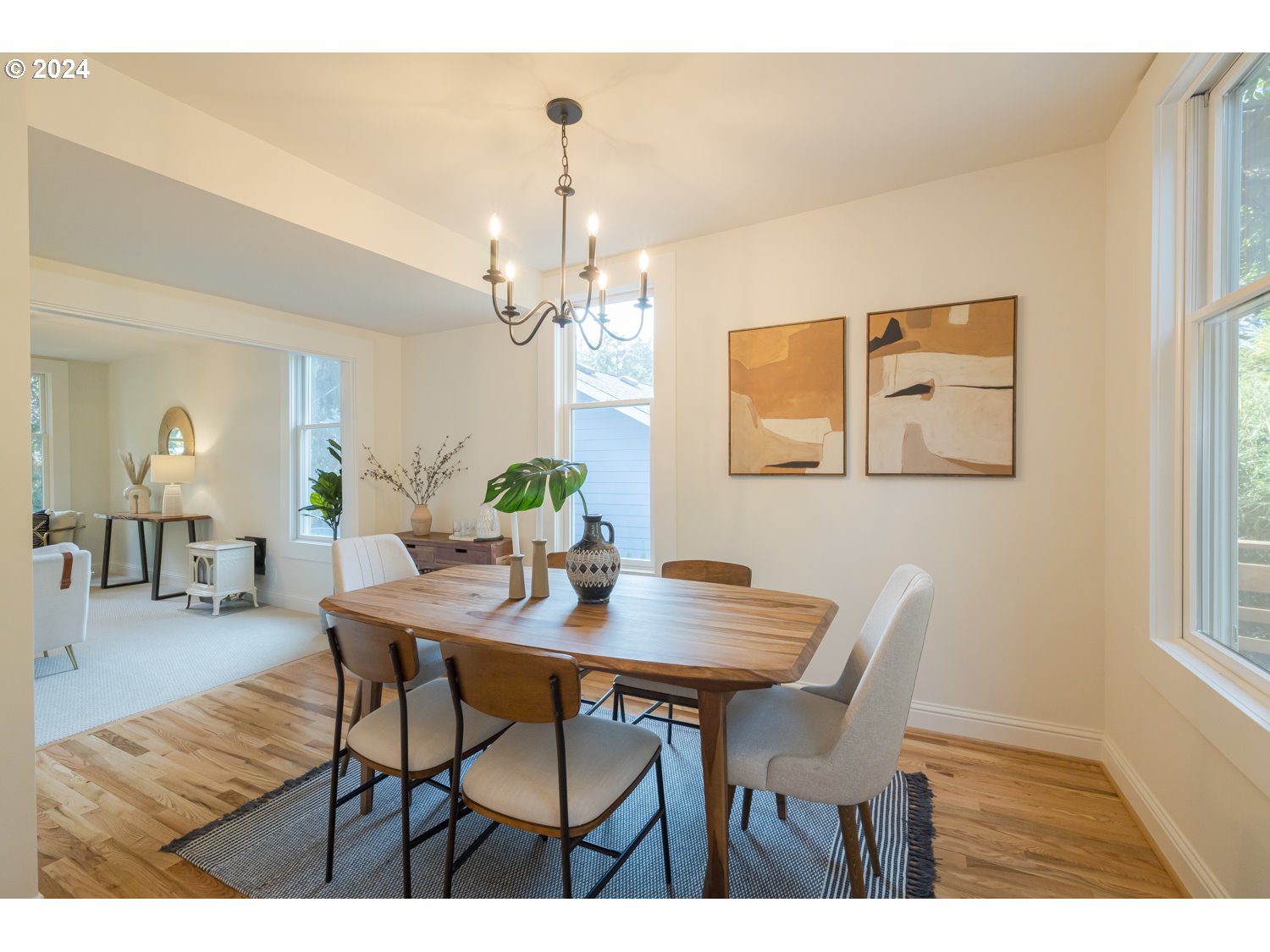 2707 Southwest Homar Avenue Portland, OR 97201 - Photo 40 of 48 a view of a dining room with furniture and wooden floor