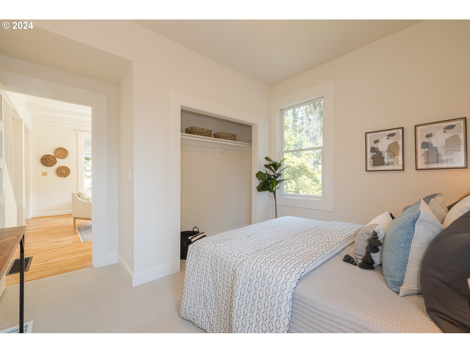 2707 Southwest Homar Avenue Portland, OR 97201 - Photo 9 of 48 a bedroom with a bed and a couch