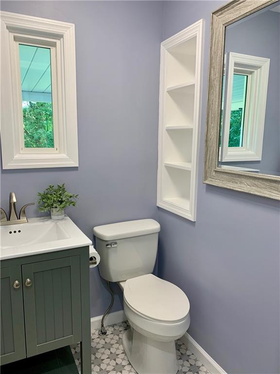 401 Bechman Street Springdale, PA 15144 - Photo 14 of 25 Another view of the 1/2 bath with newly installed window and shelving insert!