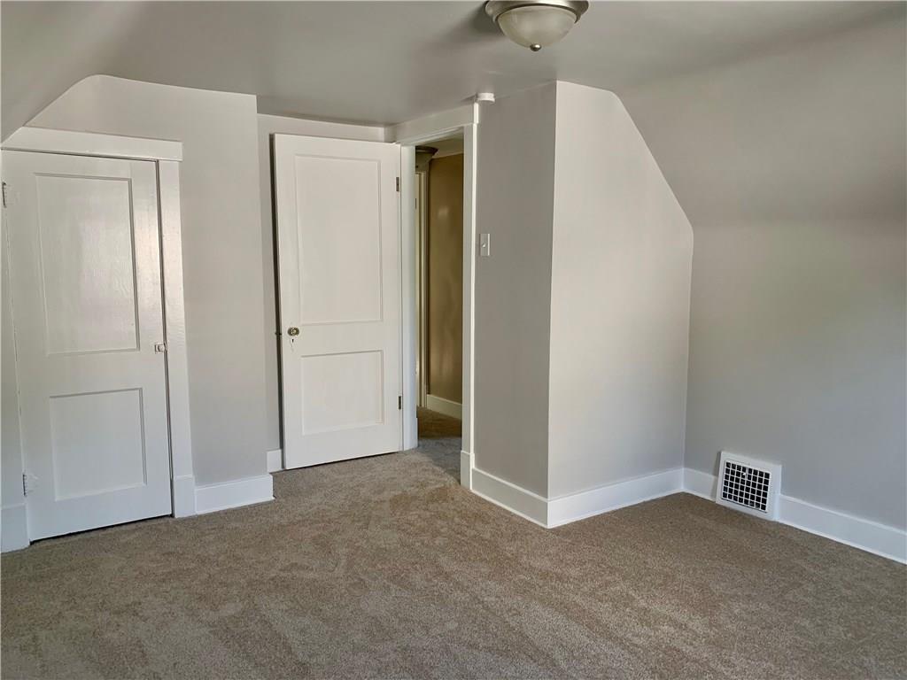401 Bechman Street Springdale, PA 15144 - Photo 16 of 25 15x12 Upper Level Bedroom with New Carpeting/Paint/Trim/Lighting/ Windows!