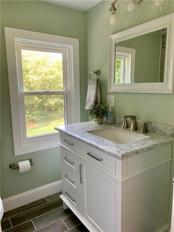 401 Bechman Street Springdale, PA 15144 - Photo 18 of 25 Upper Level Full Bath! Totally gutted with everything new! Beautiful Ceramic tile Flooring, Vanity, Fixtures, Lighting, Window, Baseboard, Trim, Walls, Ceiling!