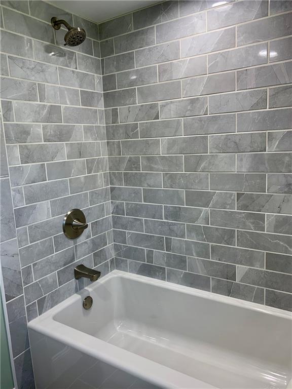 401 Bechman Street Springdale, PA 15144 - Photo 19 of 25 Upper Level Full bath Brand new Tub/Fixtures/Ceramic Tile Surround/lighting!