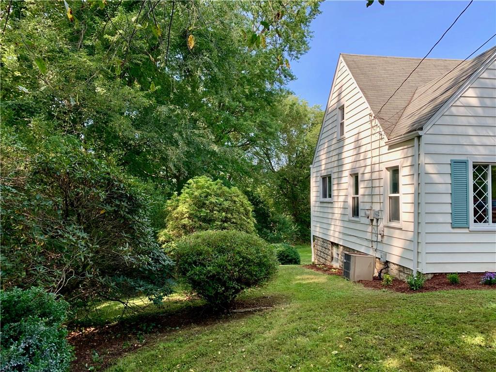 401 Bechman Street Springdale, PA 15144 - Photo 3 of 25 Side view of home showing entry into rear yard!