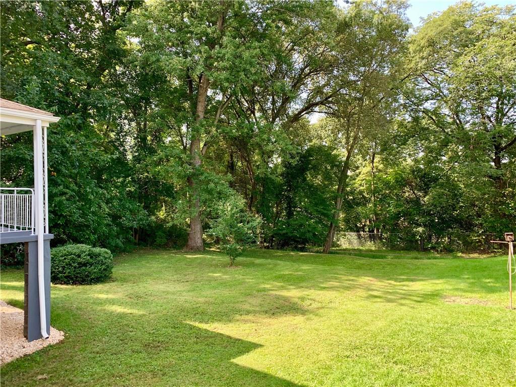 401 Bechman Street Springdale, PA 15144 - Photo 23 of 25 Wow! This lovely private lot is level and ready for entertaining! Nice covered rear porch for relaxing!