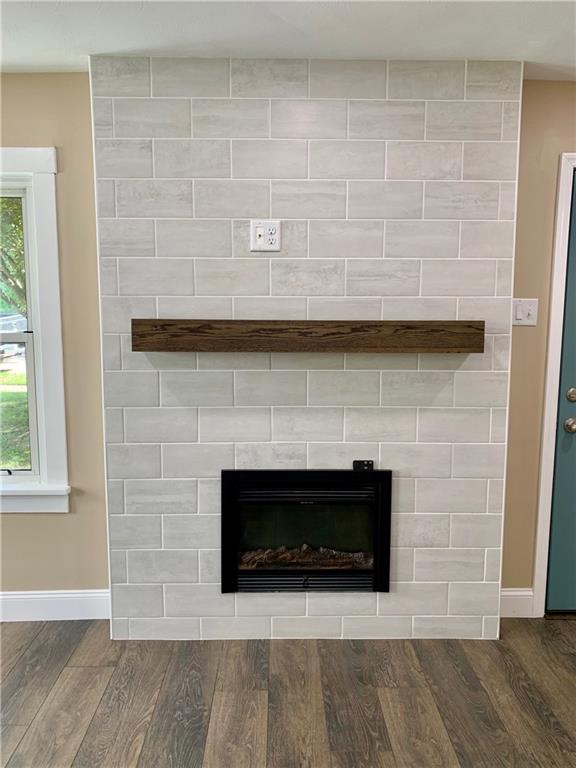 401 Bechman Street Springdale, PA 15144 - Photo 6 of 25 View of Fireplace with new electric outlet for your flat panel TV!