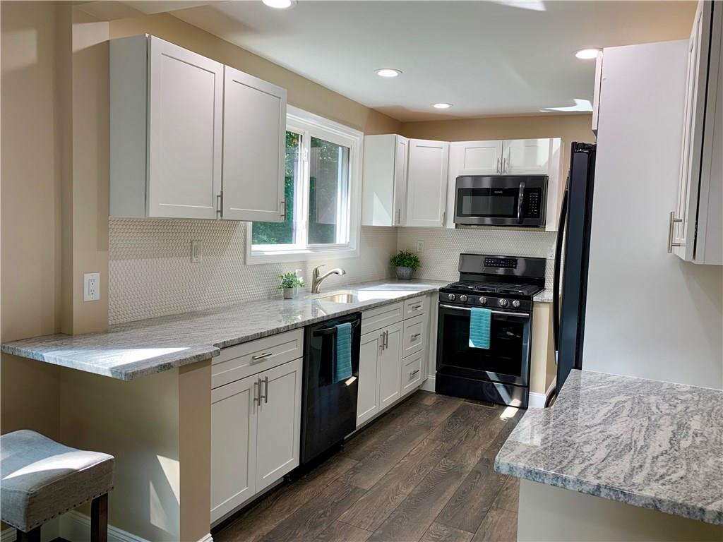 401 Bechman Street Springdale, PA 15144 - Photo 8 of 25 Another view of Fully equipped kitchen with new Window! Must see to appreciate!