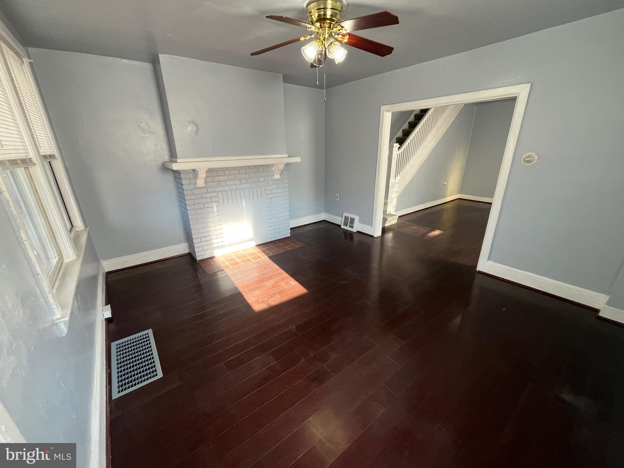240 Harding Court York, PA 17403 - Photo 13 of 31 a view of livingroom with hardwood floor and a ceiling fan