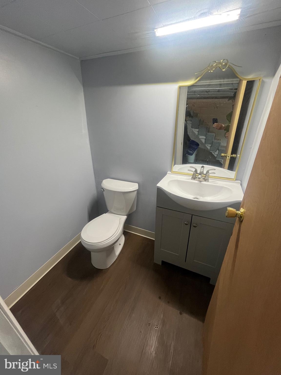 240 Harding Court York, PA 17403 - Photo 22 of 31 a bathroom with a toilet sink and mirror