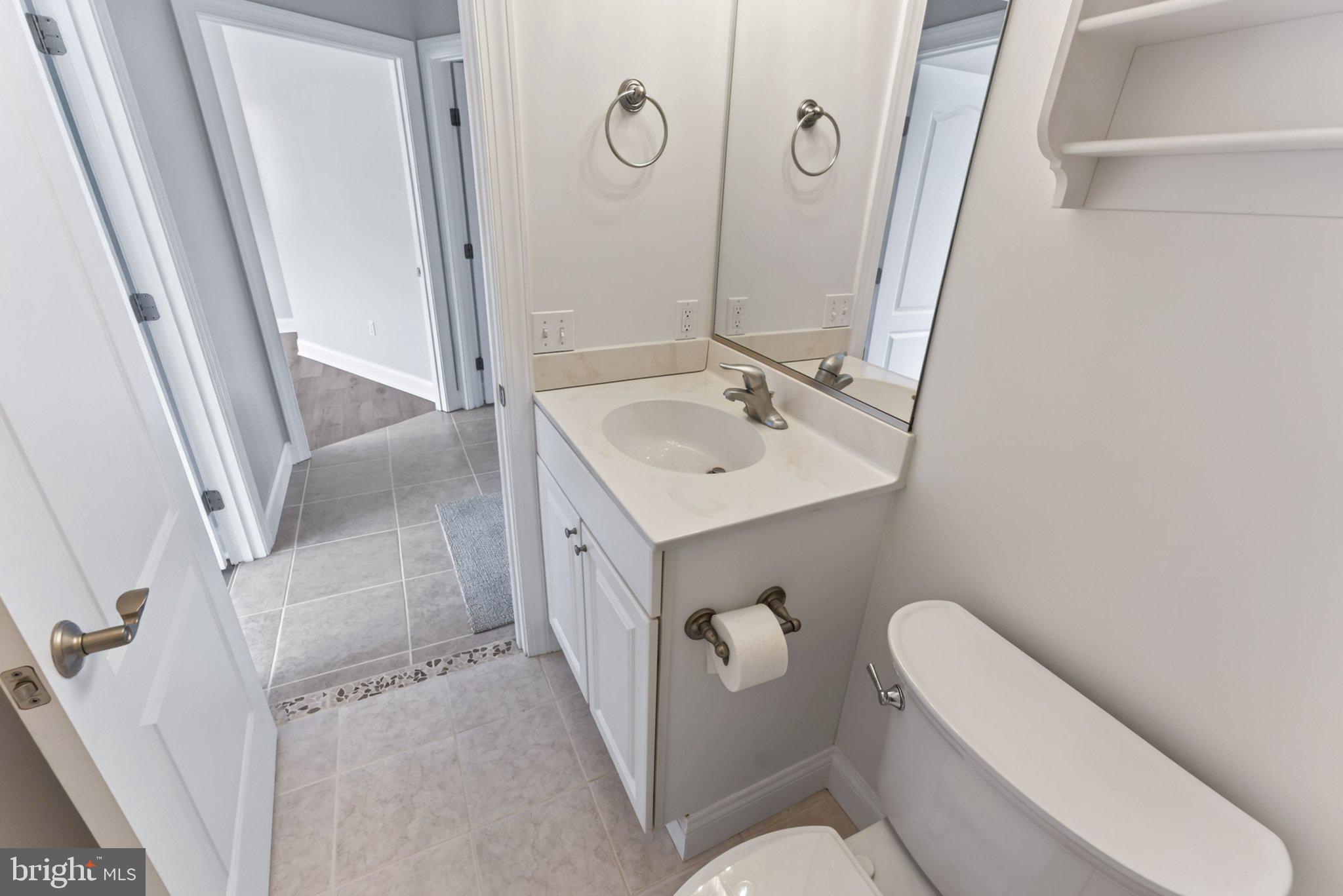 34029 Peppers Corner Road Millville, DE 19967 - Photo 18 of 101 Modern bathroom with sleek finishes.