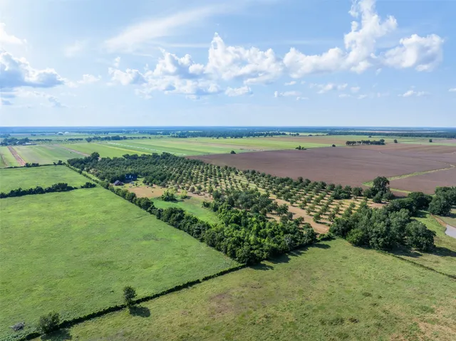 a view of a lake with a yard