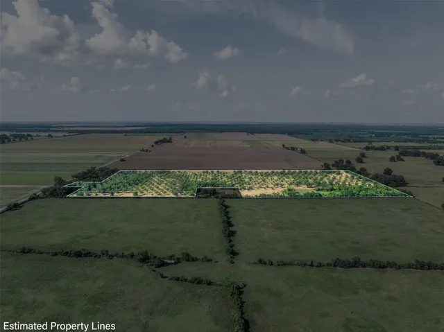 a view of a lake with a big yard