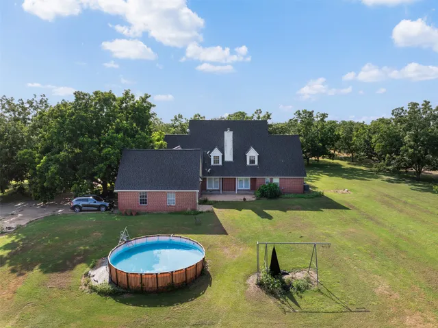 a bed room with a bed and wooden floor