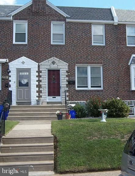 4613 Hartel Avenue Philadelphia, PA 19136 - Photo 2 of 17 a front view of a house with garden