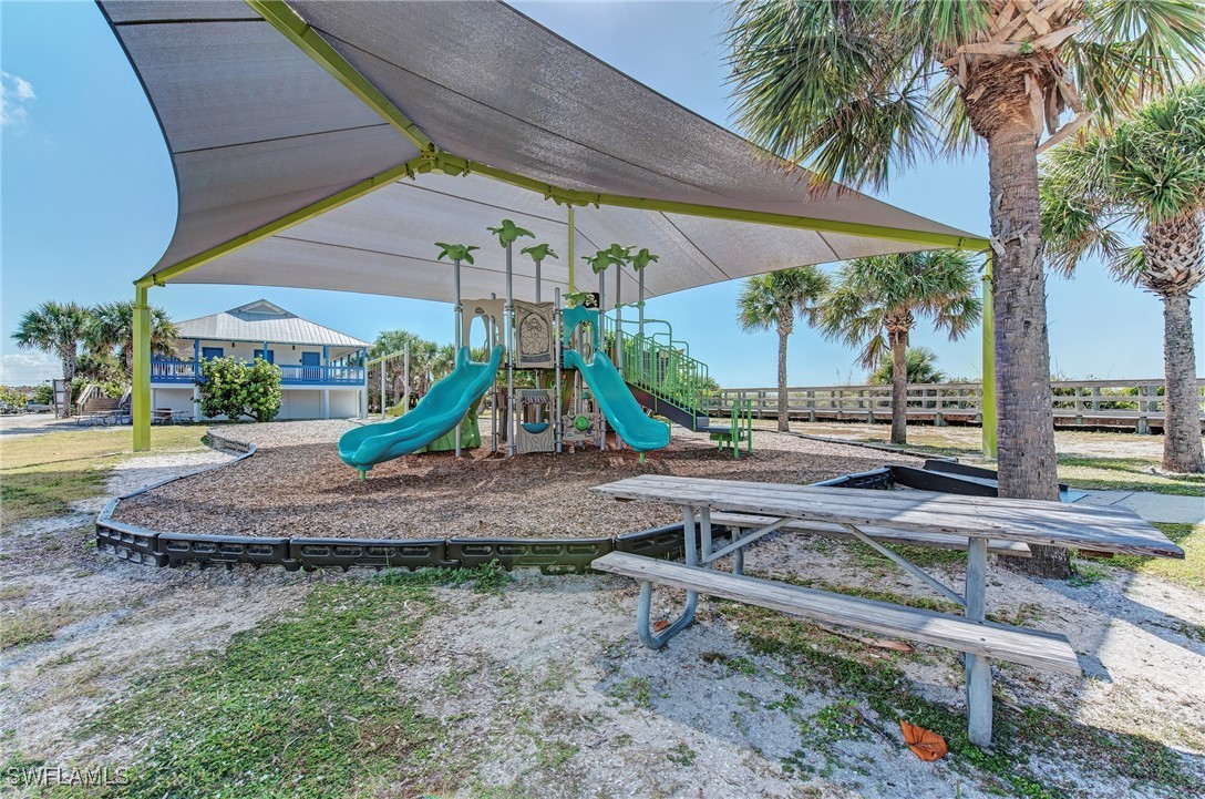 1273 Casper Street Port Charlotte, FL 33953 - Photo 12 of 26 a view of outdoor space with playground and green space