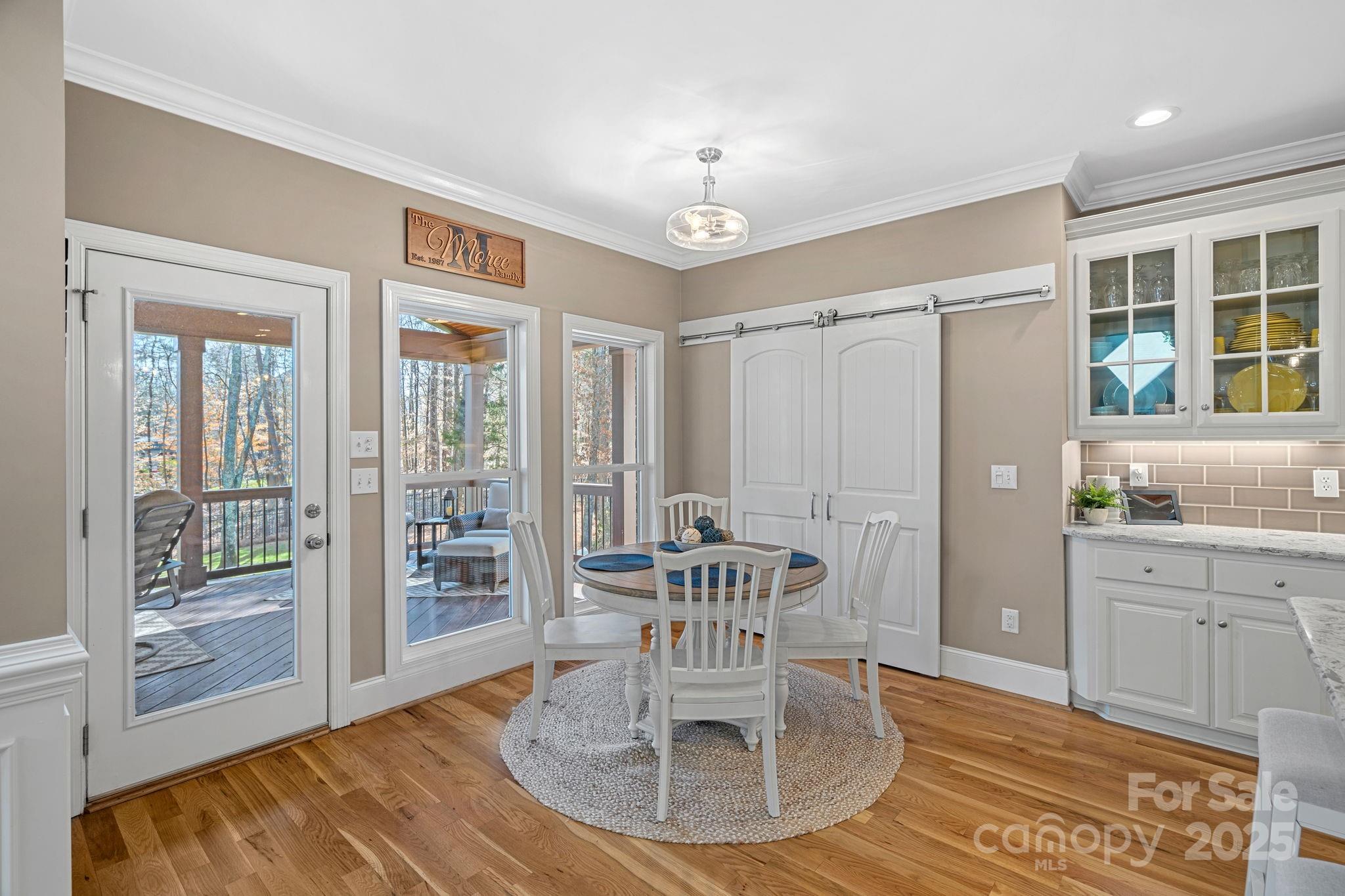 105 Elizabeth Brook Drive Davidson, NC 28036 - Photo 11 of 43 a view of a dining room with furniture window and outside view