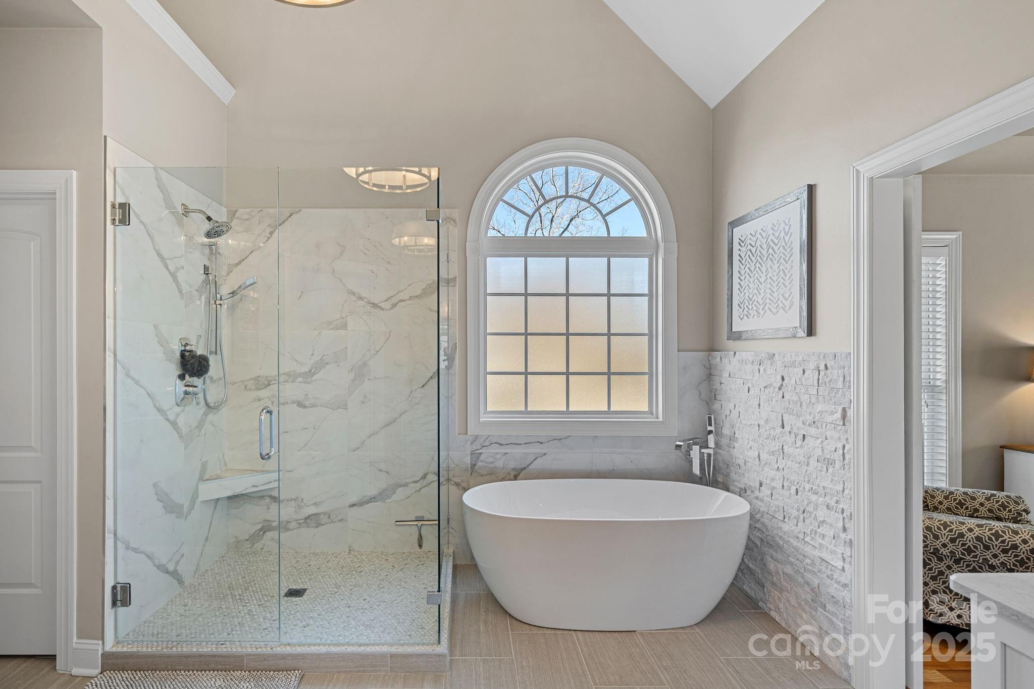 105 Elizabeth Brook Drive Davidson, NC 28036 - Photo 15 of 43 a bathroom with a granite countertop bathtub shower and a sink