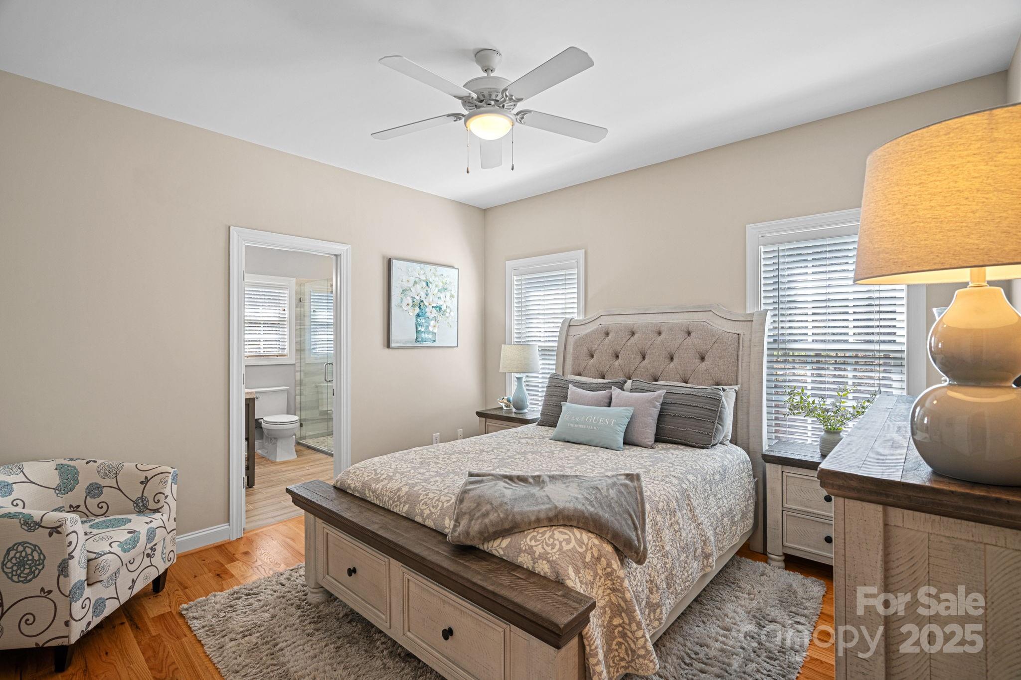 105 Elizabeth Brook Drive Davidson, NC 28036 - Photo 17 of 43 a bedroom with a large bed and a window