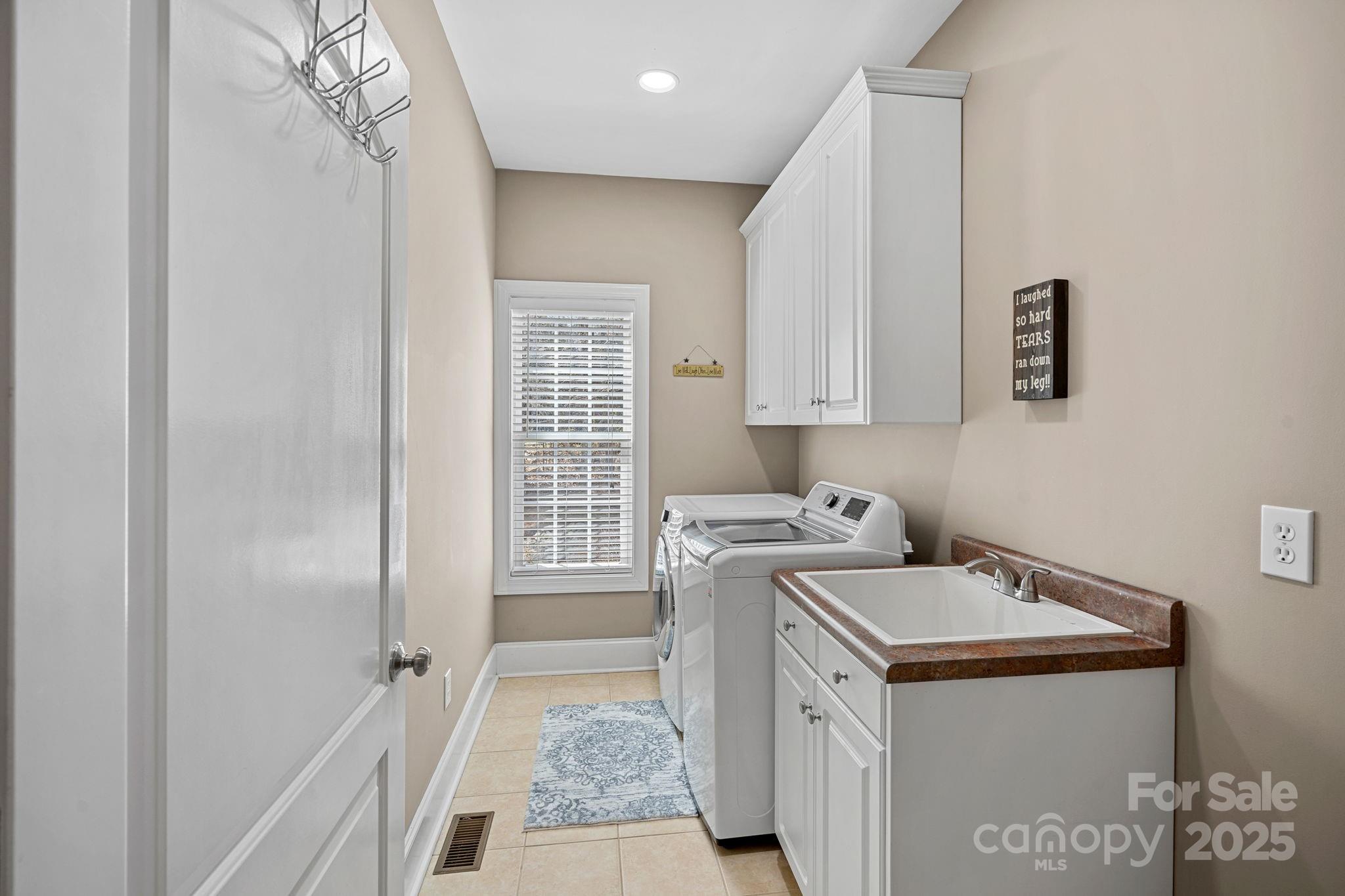 105 Elizabeth Brook Drive Davidson, NC 28036 - Photo 20 of 43 a utility room with dryer and washer