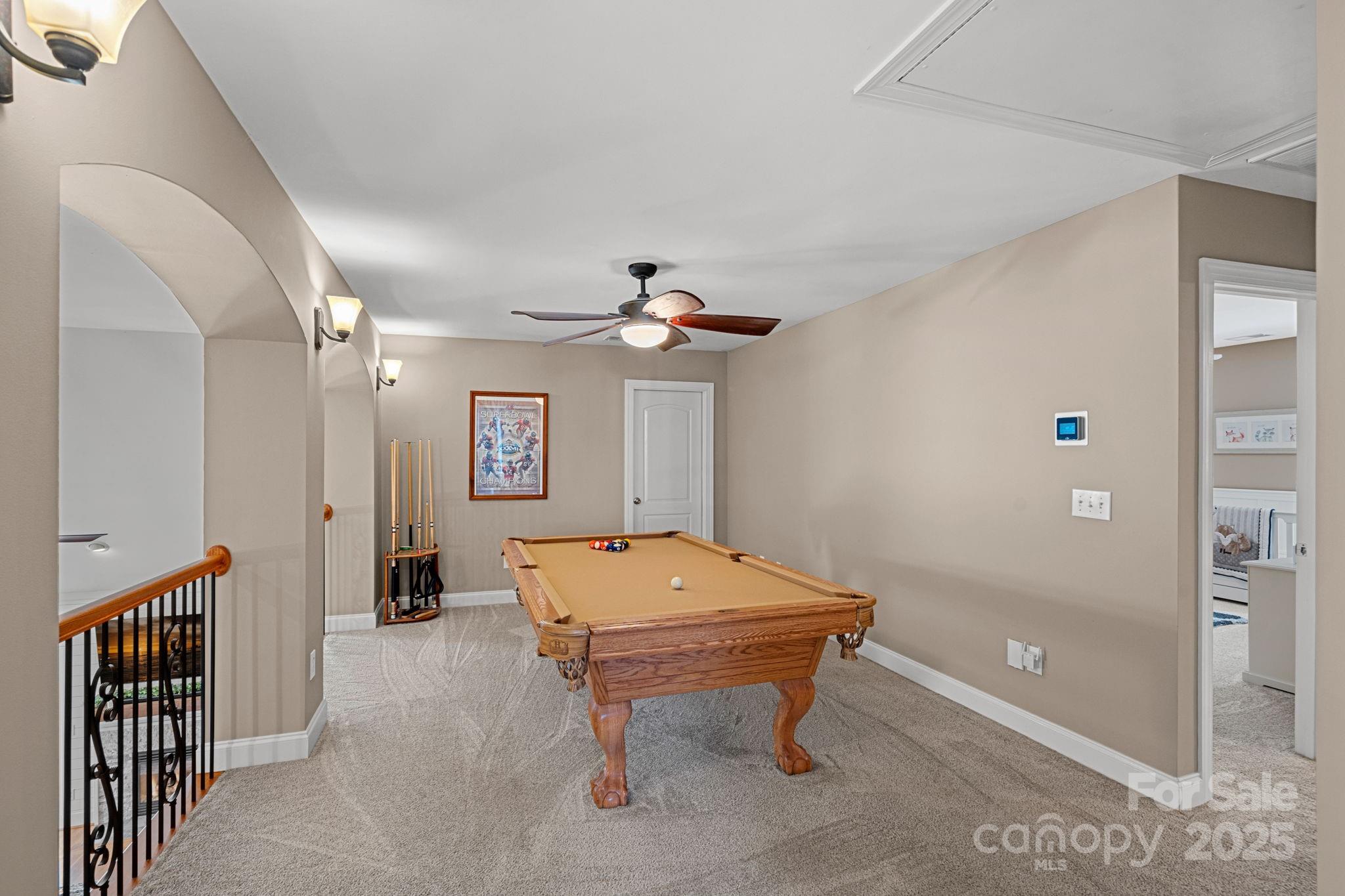 105 Elizabeth Brook Drive Davidson, NC 28036 - Photo 21 of 43 a room with pool table and windows