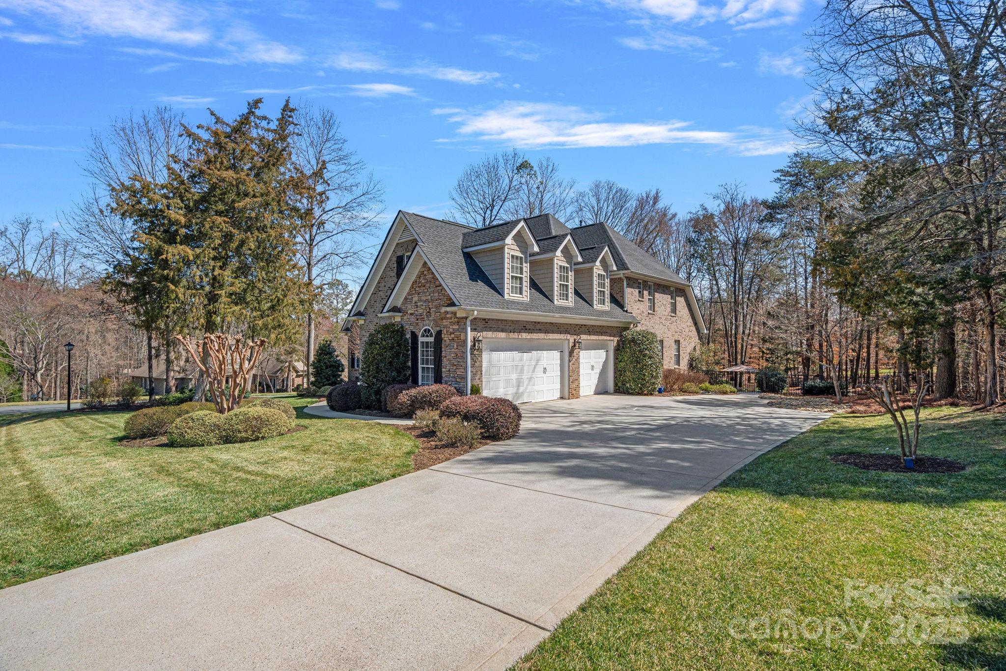 105 Elizabeth Brook Drive Davidson, NC 28036 - Photo 37 of 43 a front view of a house with a yard