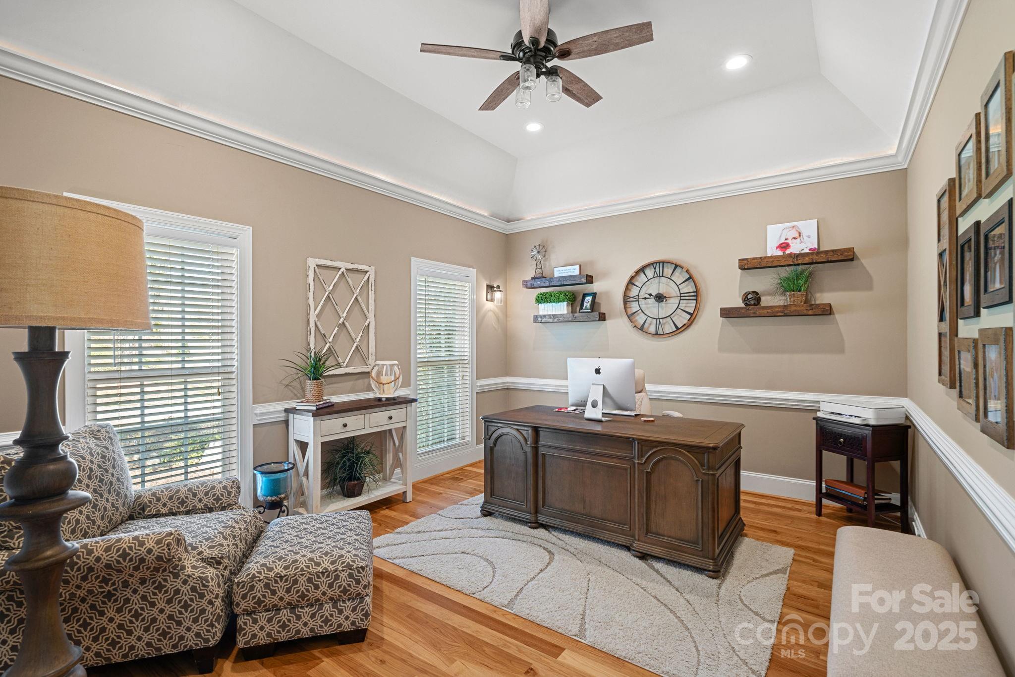 105 Elizabeth Brook Drive Davidson, NC 28036 - Photo 4 of 43 a living room with granite countertop furniture a fireplace and a window