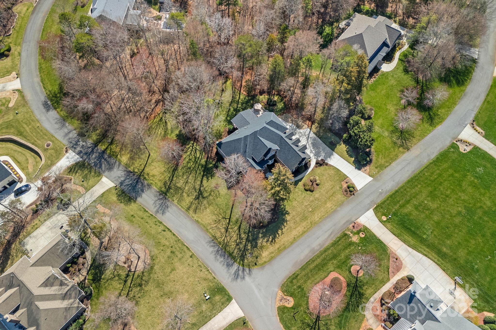 105 Elizabeth Brook Drive Davidson, NC 28036 - Photo 41 of 43 an aerial view of a house with a yard basket ball court